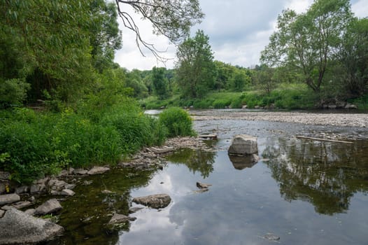 The Eder - A river in Germany in a green landscape