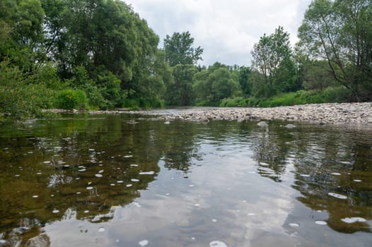 The Eder - A river in Germany in a green landscape
