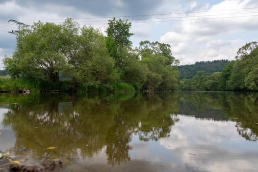 The Eder - A river in Germany in a green landscape