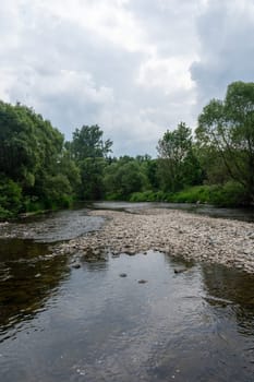 The Eder - A river in Germany in a green landscape
