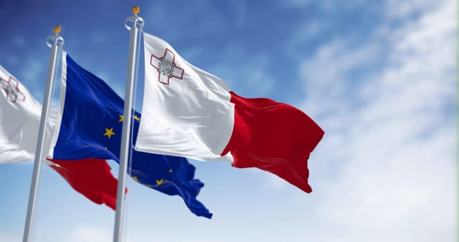 Flags of Malta and the European Union waving in the wind on a clear day. Malta became a member of the EU in may 2004. 3d illustration render. Fluttering textile