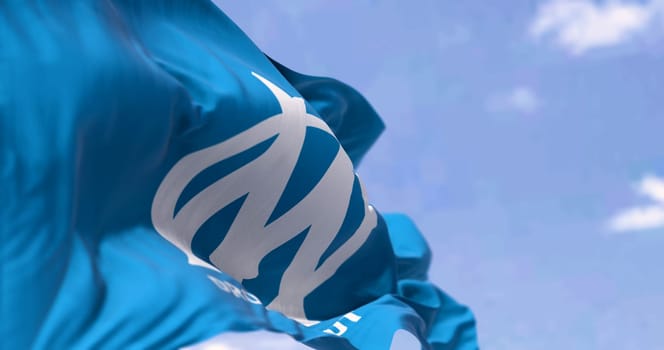 Marseille, FR, June 10 2023  Flag of Olimpique de Marseille football club waving on a clear day. French Ligue 1 Professional football team. Illustrative editorial 3d illustration render
