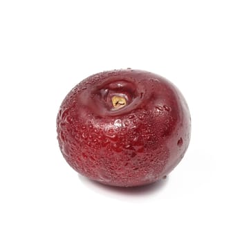 Ripe red cherry on a white isolated background