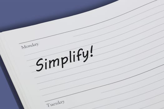 A Simplify diary reminder open on desk
