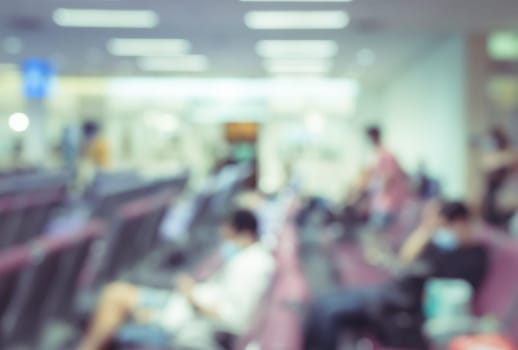 Abstract blurred background of Passengers waiting at airport boarding area