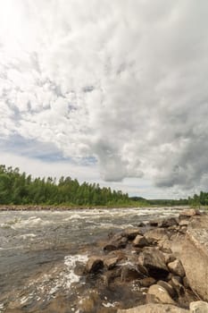 River with Forest and Cloudy Sky.
