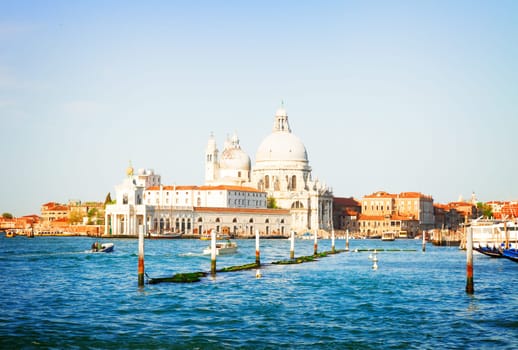 Basilica Santa Maria della Salute over  Grand canal water at sunny day, Venice, Italy, retro toned