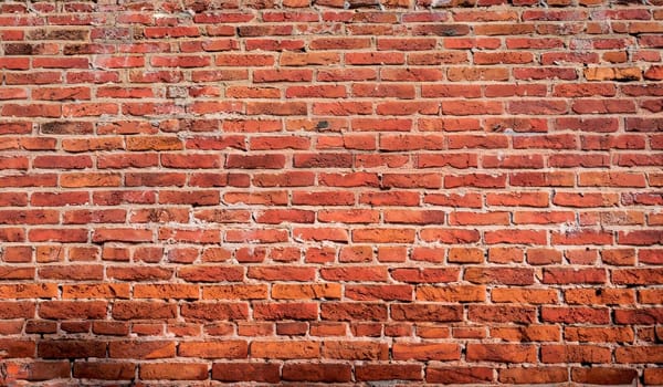 brick wall of red color, wide panorama of masonry