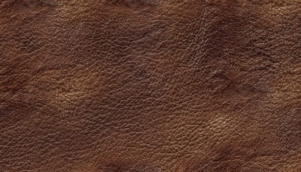 dark brown leather texture closeup can be used as background.