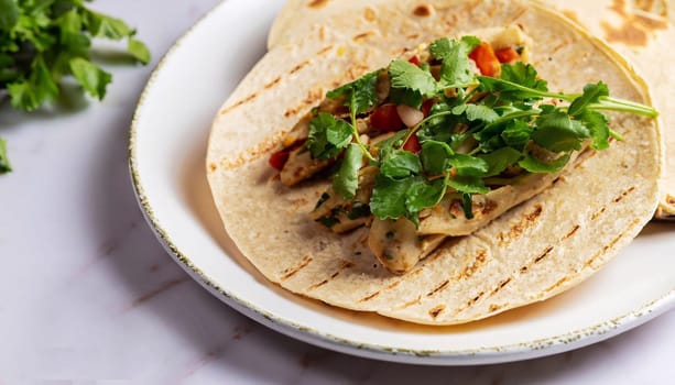 Black corn tortillas in comal. Guatemalan corn tortillas. Close up of tortillas in comal