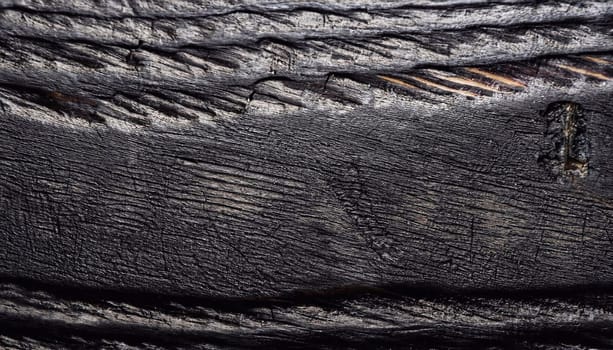 Dark wood texture background. Vintage old black boards hardwood. Charcoal timber quality high. Pattern wood grain material polished. Wooden floor detailed photo.