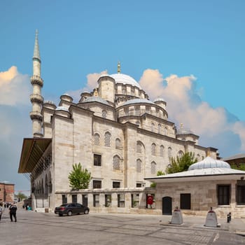 Istanbul, Turkey - May 16 2023: New Mosque, or Yeni Cami, an Ottoman imperial mosque built by Safiye Sultan, wife of Sultan Murad III in 1597, situated on the Golden Horn, near Galata Bridge, Eminonu