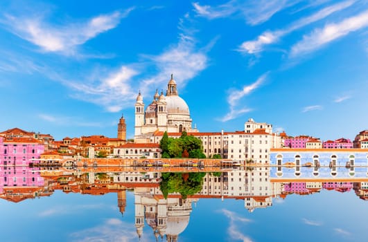 Santa Maria della Salute Church in the Grand Canal, side view, Venice, Italy.