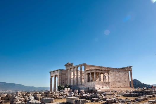 ATHENS, GREECE - 06/23/2013 - panoramic background with Acropolis, porch of caryatids, Erechtheum Temple in Athens, Greece