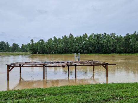 06.08.2023. High water level of the Drava River near Donja Dubrava, Croatia. The water overflowed the river bed and threatens the settlement.