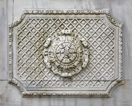 Aged marble wall of imperial Ottoman summer Ihlamur Pavilion with carved pattern ornaments and carved details, Istanbul, Turkey