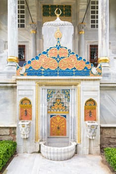 Public drinking fountain, attached to the Library of Ahmed III, or Enderun Library, located in the third courtyard of Topkapi Palace, Istanbul, Turkey