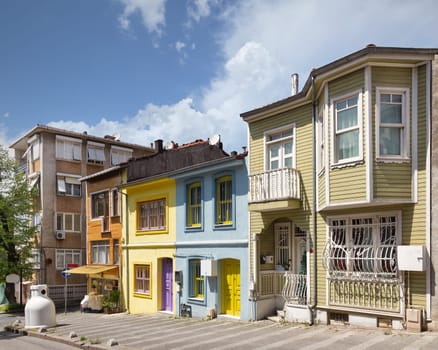 Row of colorful houses in Uskudar, Istanbul, Turkey, on the Asian side of the city, the houses are painted in a variety of bright colors, creating a stunning visual effect