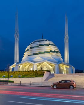 Night shot of Mosque of the Faculty of Theology, Marmara University, a modern Islamic architecture mosque, located in Uskudar district, Istanbul, Turkey