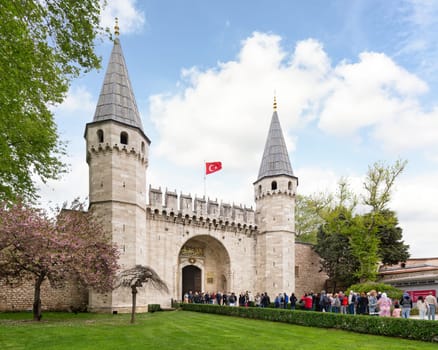 Istanbul, Turkey - May 11, 2023: Topkapi Palace: The large Gate of Salutation, aka the Middle Gate, or Orta Kapi, leads to the Second Courtyard of the palace