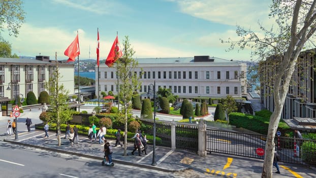 Istanbul, Turkey - May 8, 2023: View from Ciragan street of modern architectural design five stars Four Seasons hotel by Bosphorus Strait, at Besiktas district, in a spring day