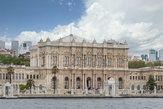 Istanbul, Turkey - May 10, 2023: View from Bosporus strait of Dolmabahce Palace, or Dolmabahce Sarayi, located in Besiktas district on the European coast