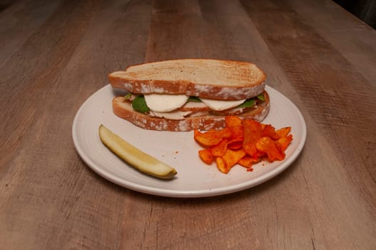 Traditional and authentic American dish known a the chicken caprese sandwich