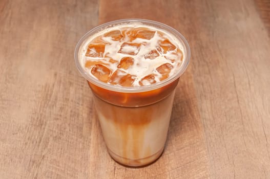 Delectable coffee drink known as iced Caramel Macchiato