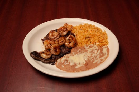 seafood delicacy known as steak and shrimp