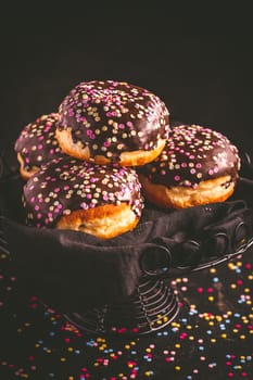 Berliner donuts, filled with jam and colorful confetti