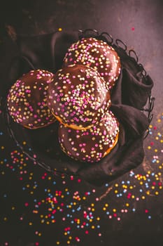 Berliner donuts, filled with jam and colorful confetti