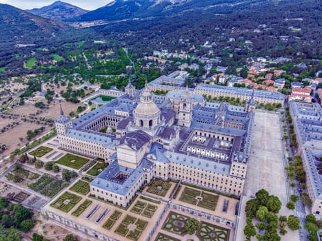 Aerial view of the Royal Monastery of San Lorenzo de El Escorial near Madrid, Spain. Rear side panoramic aerial view