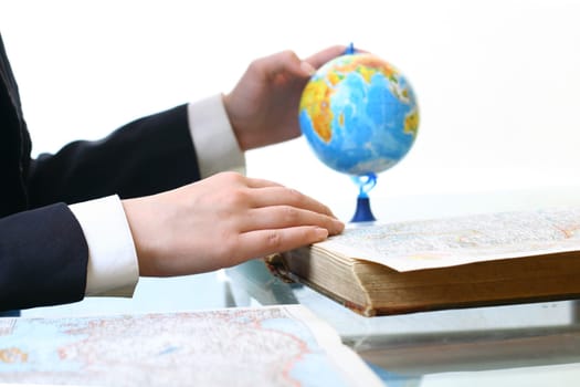 looking on earth globe where to travel