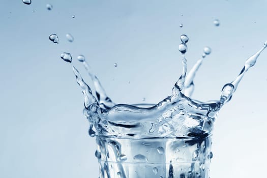 super splash in glass on white background