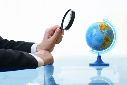 looking on earth globe where to travel