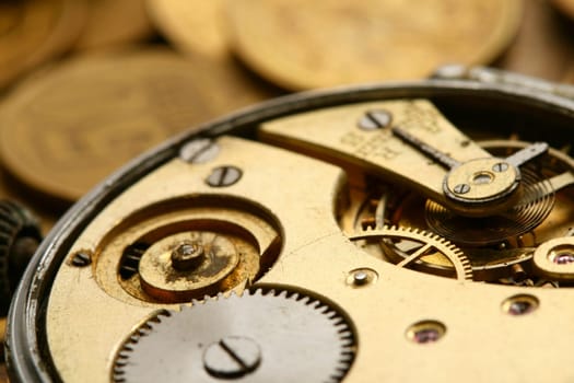 time is money coins and clock macro concept