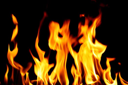inferno flame fire on black background close up