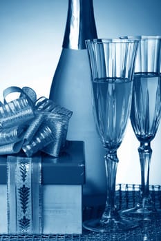 blue new year eve card - champagne and gift
