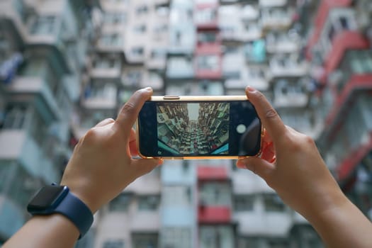 Take Photo with Yick Fat Building, Quarry Bay, Hong Kong. Residential area in old apartment