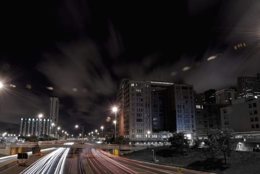 Nighttime highway traffic in downtown district