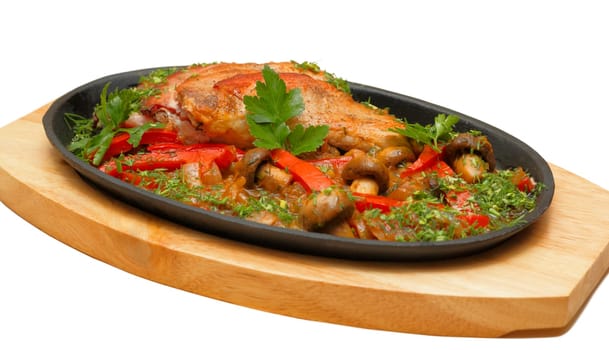 Fried meat with vegetables and mushrooms (session in restaurant)