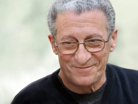 A portrait of a smiling senior man