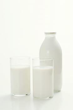 Fresh glasses of milk isolated over white background