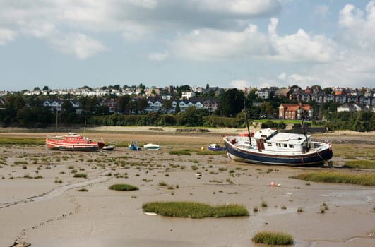 boats at low tide in Southern Wales