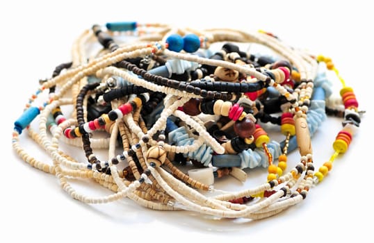 Wood and seashell bead necklaces close up