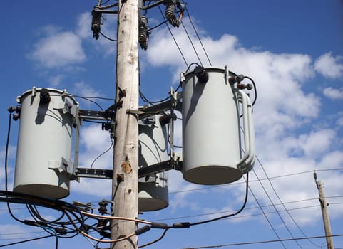 A close-up shot of a hydro pole transformer.