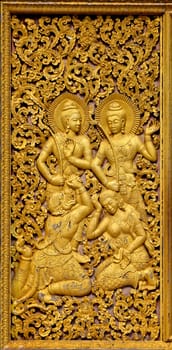 a golden frame with 4 budhist figures and ornaments