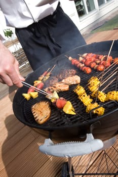 Man at the grill outdoor
