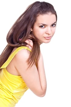 beautiful woman in a yellow dress on a white background isolated