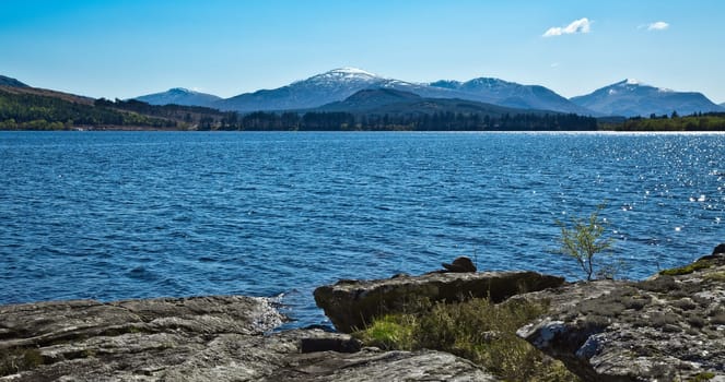 A photography of a typical scottish loch
